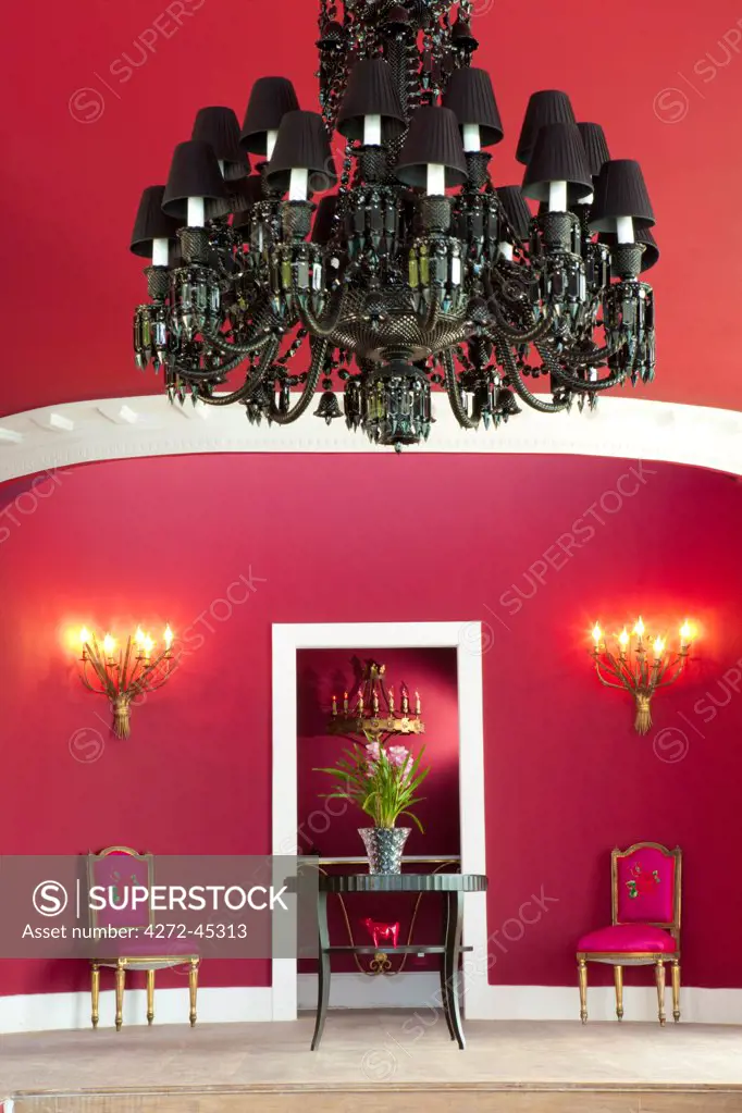 Brazil, Rio de Janeiro city, Joatinga, La Suite Hotel, lobby area of the hotel showing pink chairs and chandelier PR