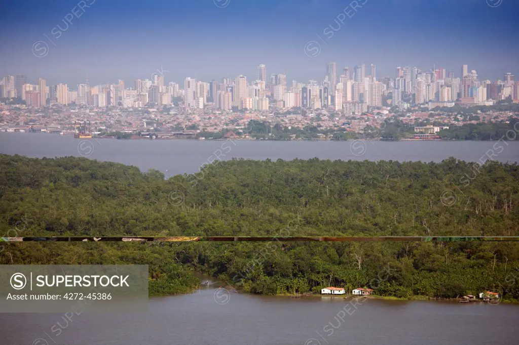South America, Brazil, Para, Amazon, an aerial shot of the city of Belem on Guajara Bay in the southern mouth of the Amazon confluence with mangrove and varzea forest and stilt houses in the foreground