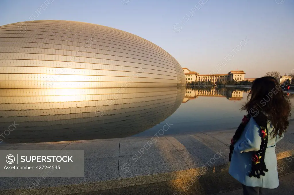 China, Beijing. The National Grand Theatre Opera House known as The Egg and designed by French architect Paul Andreu. (MR).