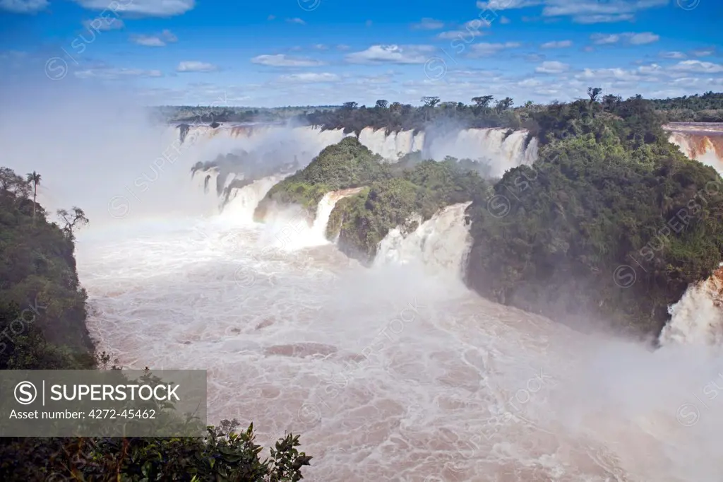 South America, Brazil, Parana, the Garganta do Diabo, Devils Throat, at the Iguazu falls, shown in full flood. The falls lie on the frontier of Brazil and Argentina.