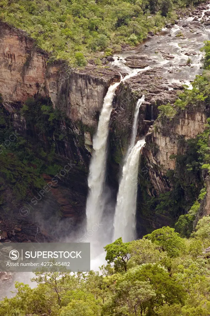 South America, Brazil, Goias, Chapada dos Veadeiros, the cachoeira do Rio Preto waterfalls falling into a canyon in the UNESCO World Heritage listed Chapada dos Veadeiros national park, PR