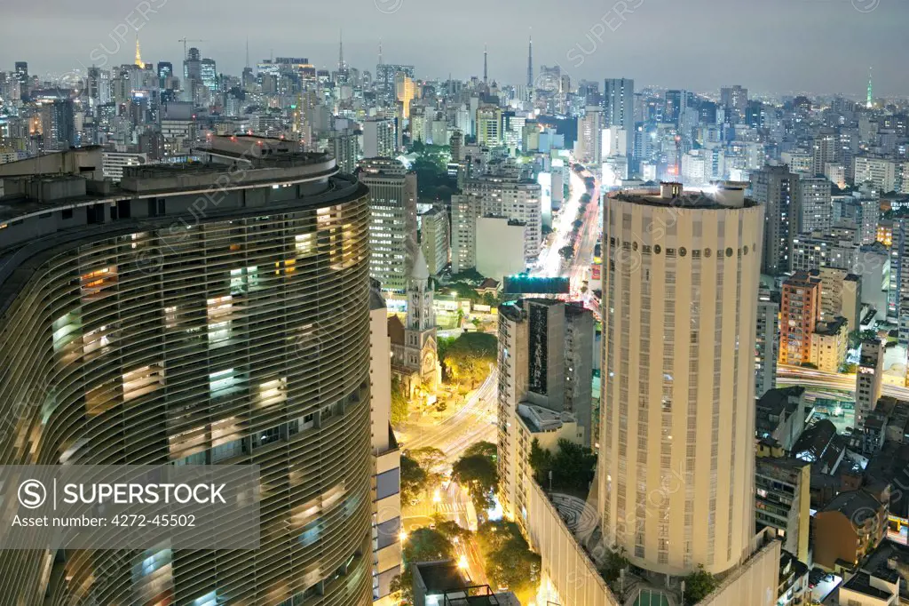 South America, Brazil, Sao Paulo, view from the top of the Terraco Italia Tower showing the Consolacao church and neighbourhood and with Oscar Niemeyers Copan building in the foreground