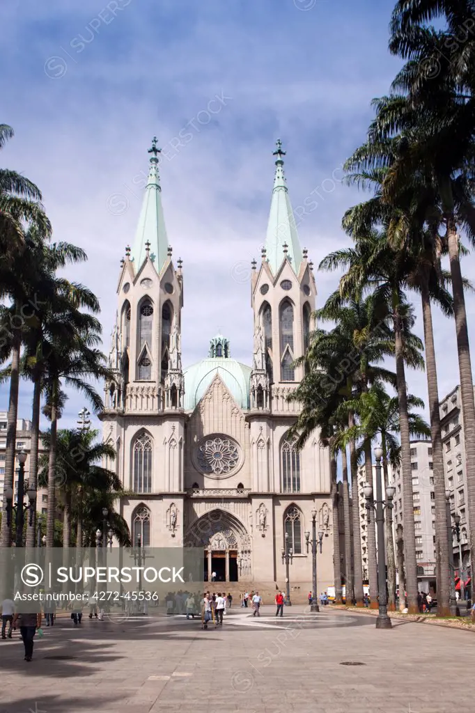 South America, Brazil, Sao Paulo, Sao Paulo Metropolitan Cathedral set in the palm tree shaded Cathdral Square