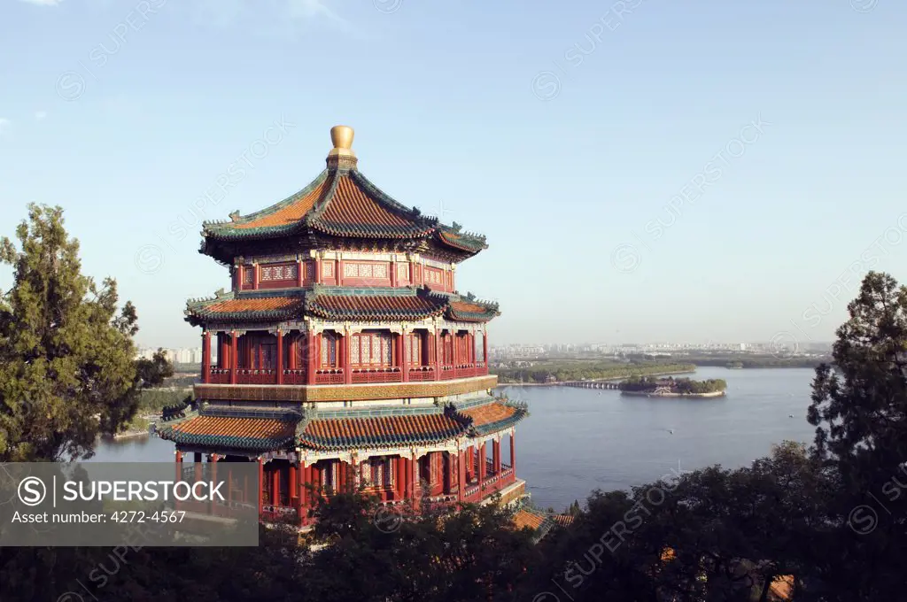 China, Beijing. Summer Palace - Unesco World Heritage Site. A Pagoda overlooking Lake Kunming and the city.