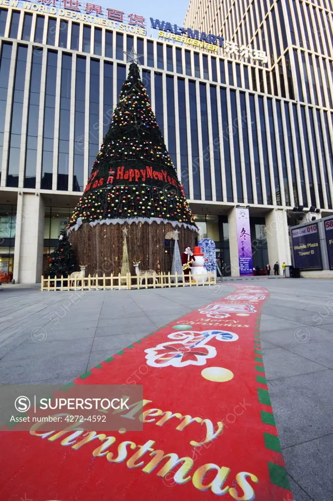 China, Beijing. Christmas tree decorations at a Wanda Plaza department store.