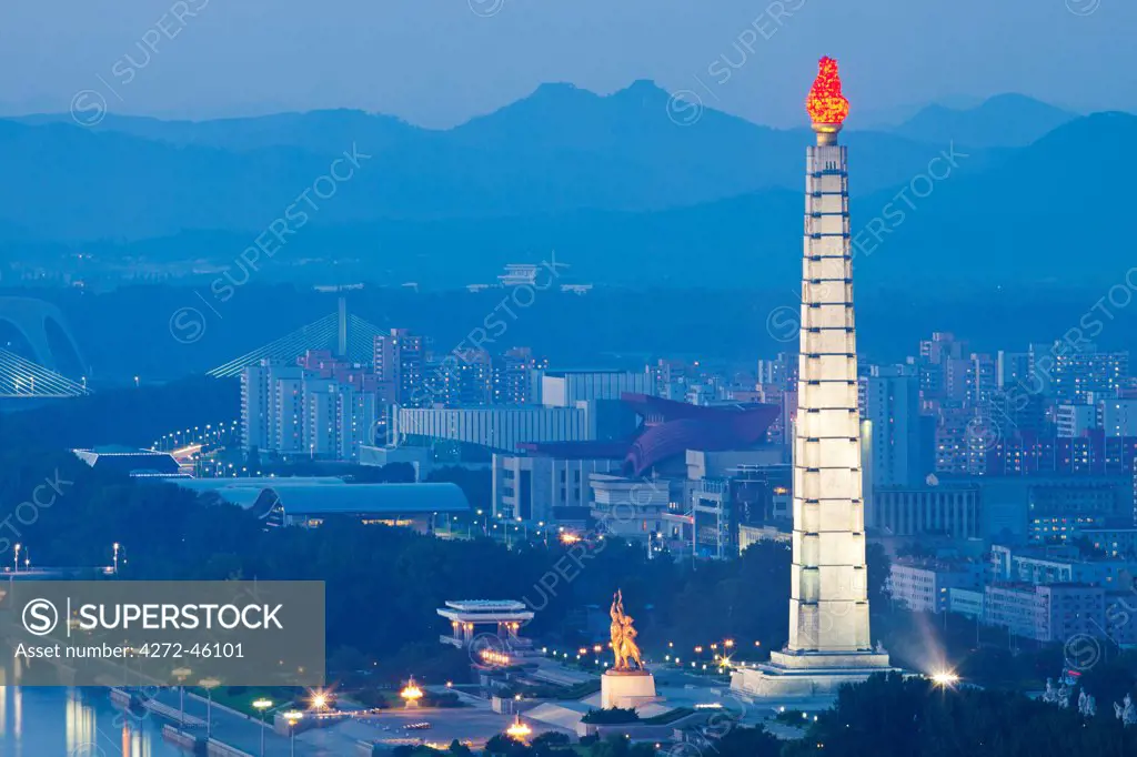 Democratic Peoples Republic of Korea, North Korea, Pyongyang. View of the Juche Tower and Taedong River from the Yanggakdo Hotel.