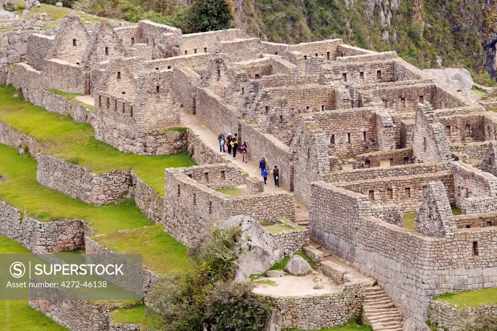 South America, Peru, Cusco, Machu Picchu. A general view of terraces and buildings at the World Heritage listed Inka Historic Sanctuary of Machu Picchu, situated in the Andes above the Urubamba valley
