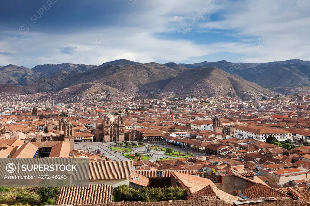 South America, Peru, Cusco. A view of Cusco from Sacsayhuaman showing the Plaza de Armas with the cathedral to the left, the Jesuit church of the Company of Jesus, Compania de Jesus, in the middle and the church of La Merced to the right of shot in the UNESCO World Heritage listed former Inca capital of Cusco