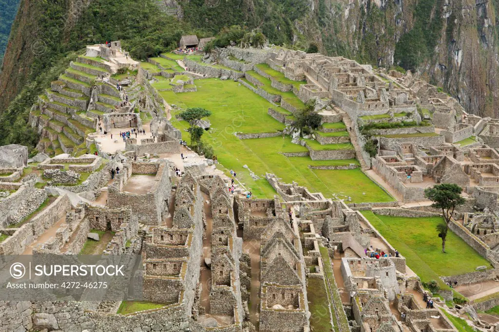 South America, Peru, Cusco, Machu Picchu. A general view of terraces and buildings at the World Heritage listed Inka Historic Sanctuary of Machu Picchu in the Andes above the Urubamba valley