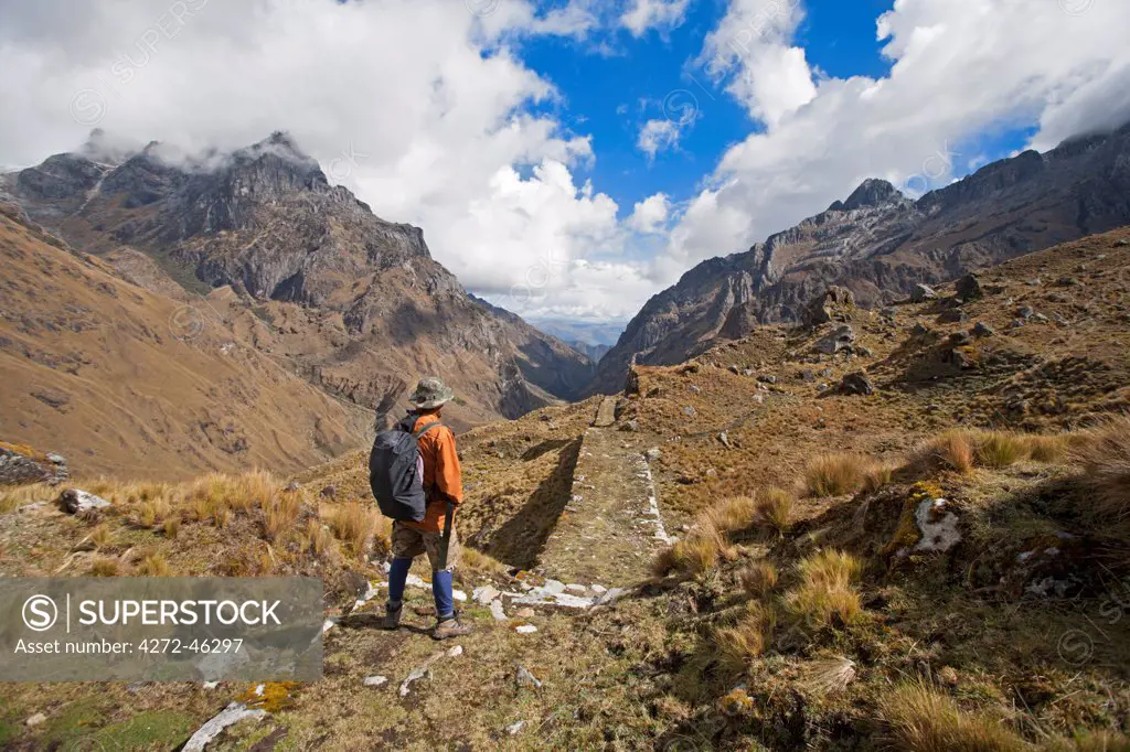South America, Peru, Cusco. A hiker on an Inca road on the trail to Choquequirao
