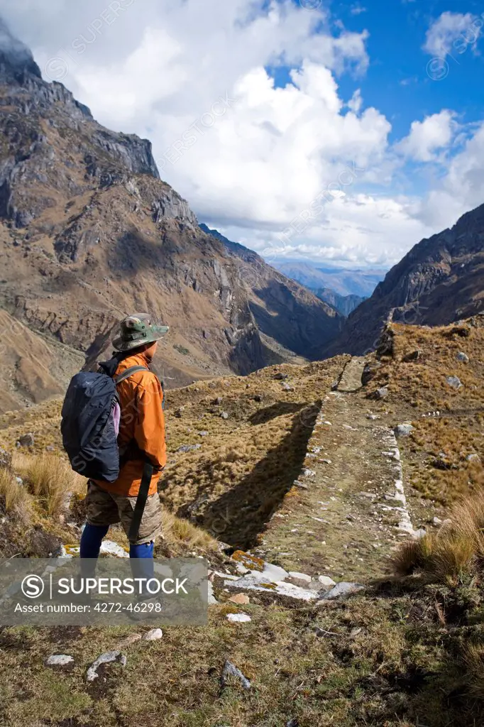 South America, Peru, Cusco. A hiker on an Inca road on the trail to Choquequirao