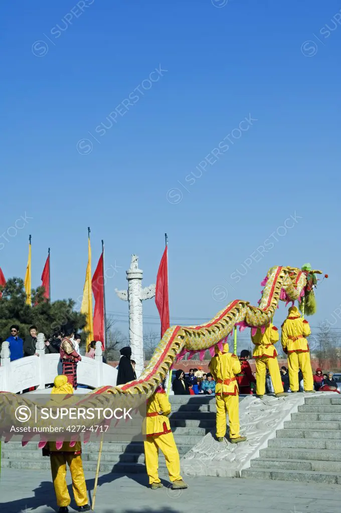 China, Beijing. Beiputuo temple and film studio. Chinese New Year Spring Festival - Dragon Dance performers.