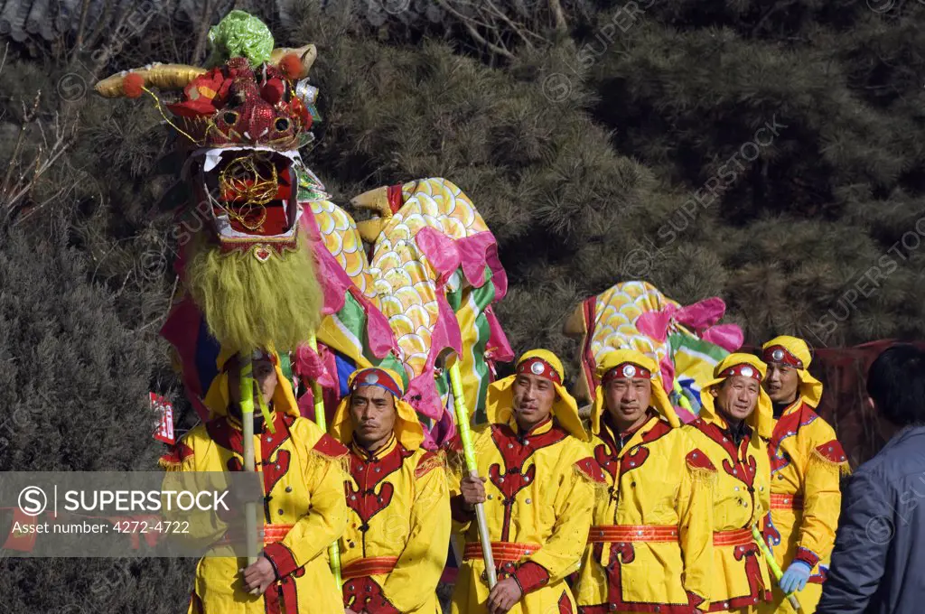 China, Beijing. Beiputuo temple and film studio. Chinese New Year Spring Festival - Dragon Dance performers.