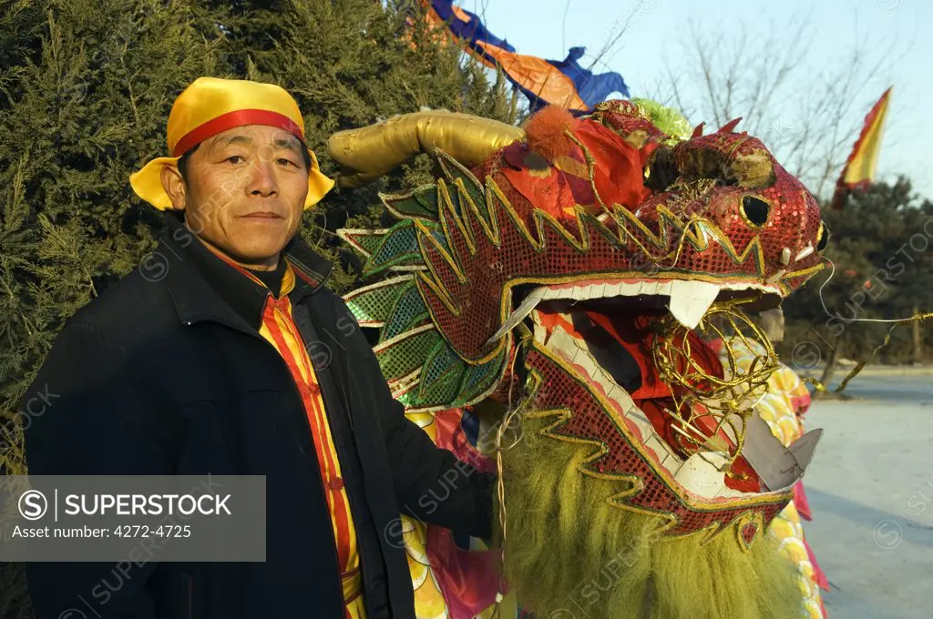 China, Beijing. Beiputuo temple and film studio. Chinese New Year Spring Festival - Dragon Dance performer.