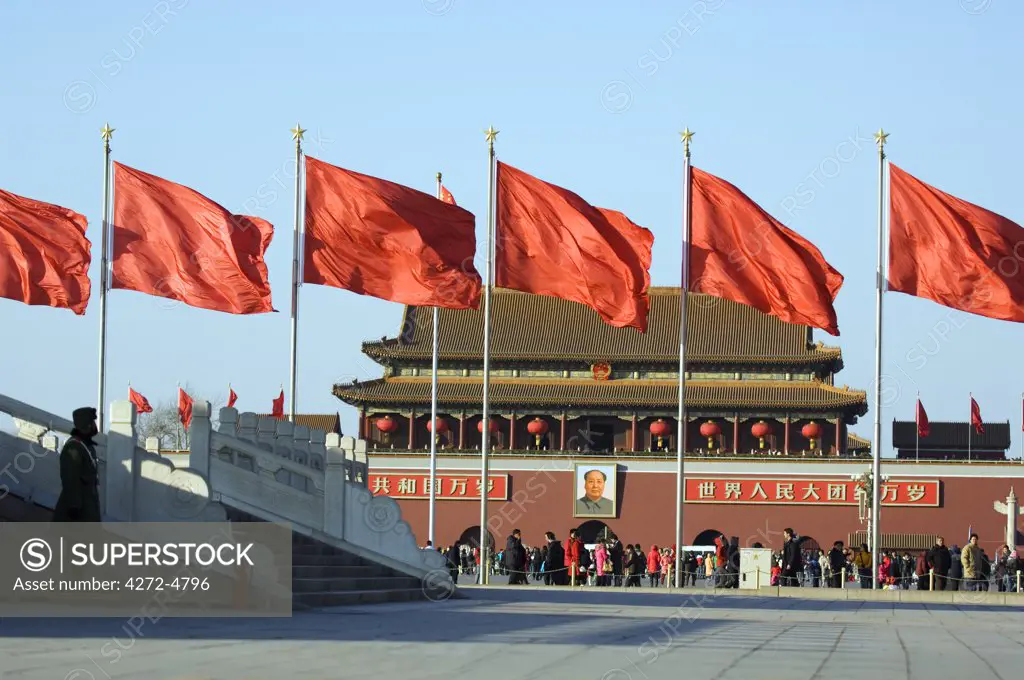 China, Beijing. Chinese New Year Spring Festival - flags and red lantern decorations on the Gate of Heavenly Peace in Tiananmen Square.