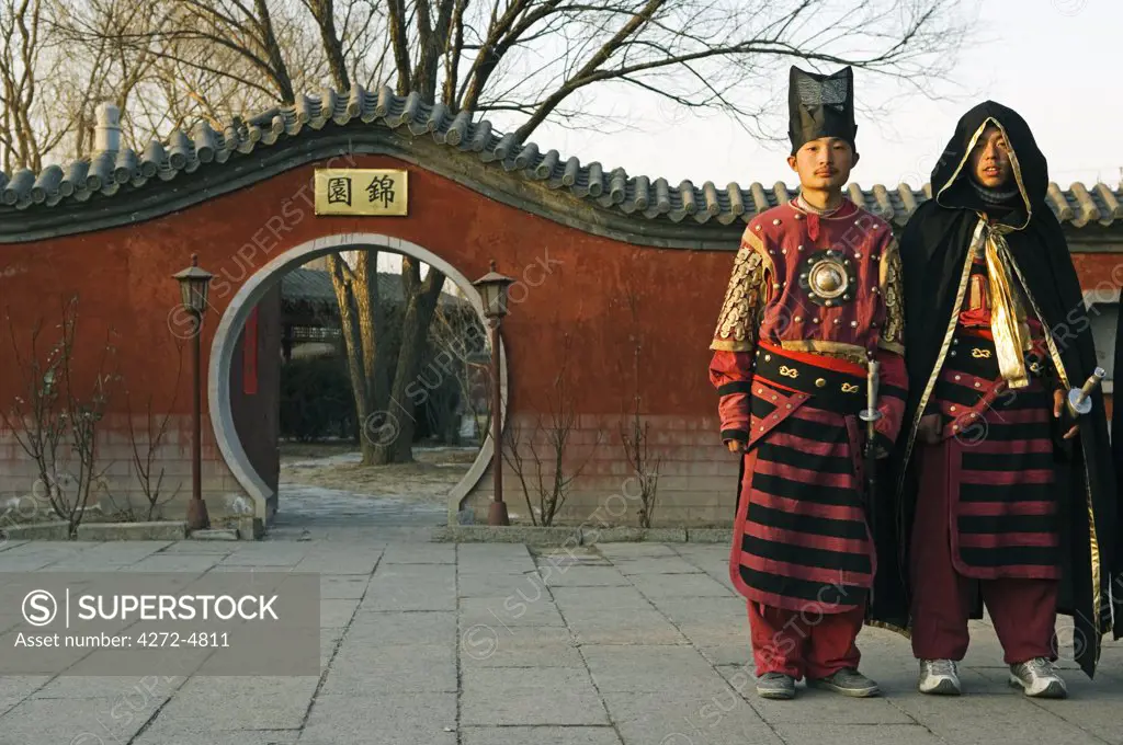 China, Beijing. Beiputuo temple and film studio - Chinese New Year Spring Festival - guards in traditional costume.