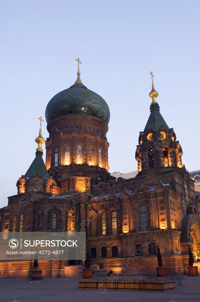 China, Northeast China, Heilongjiang Province, Harbin City. St Sophia Russian Orthodox Church illuminated at night built in 1907 in the Daoliqu area.