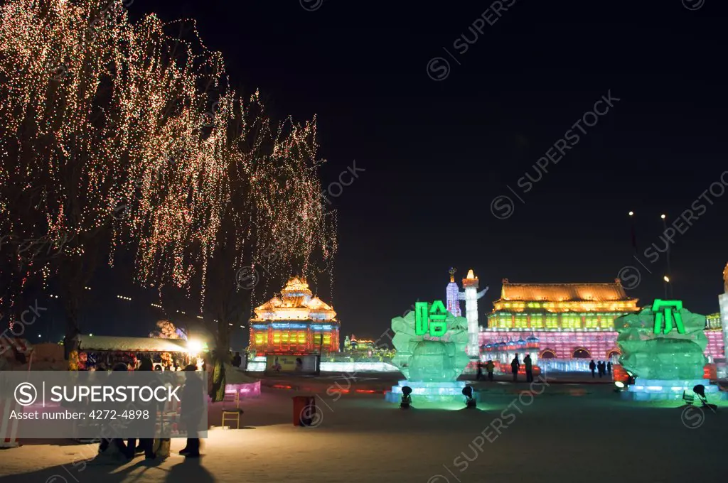 China, Northeast China, Heilongjiang Province, Harbin City. Ice Lantern Festival. Colourful ice sculptures illuminated at night