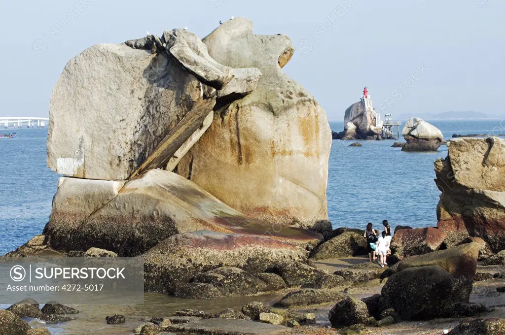 China, Fujian Province, Xiamen. A huge rock on the beach at Gulang Yu island