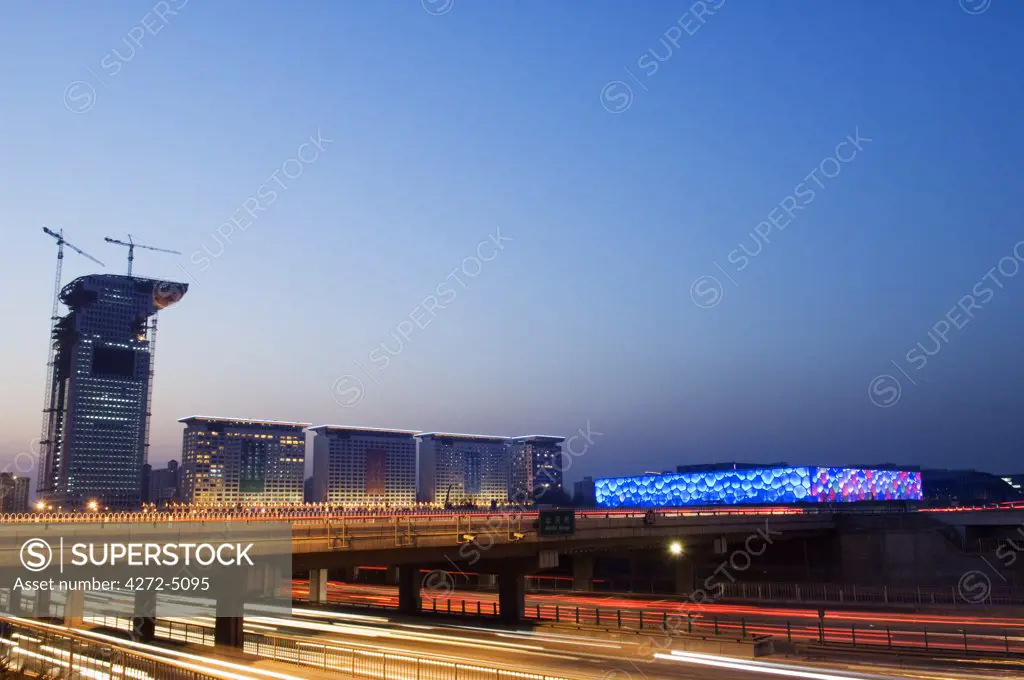 China, Beijing. The Water Cube National Aquatics Centre lit at dusk