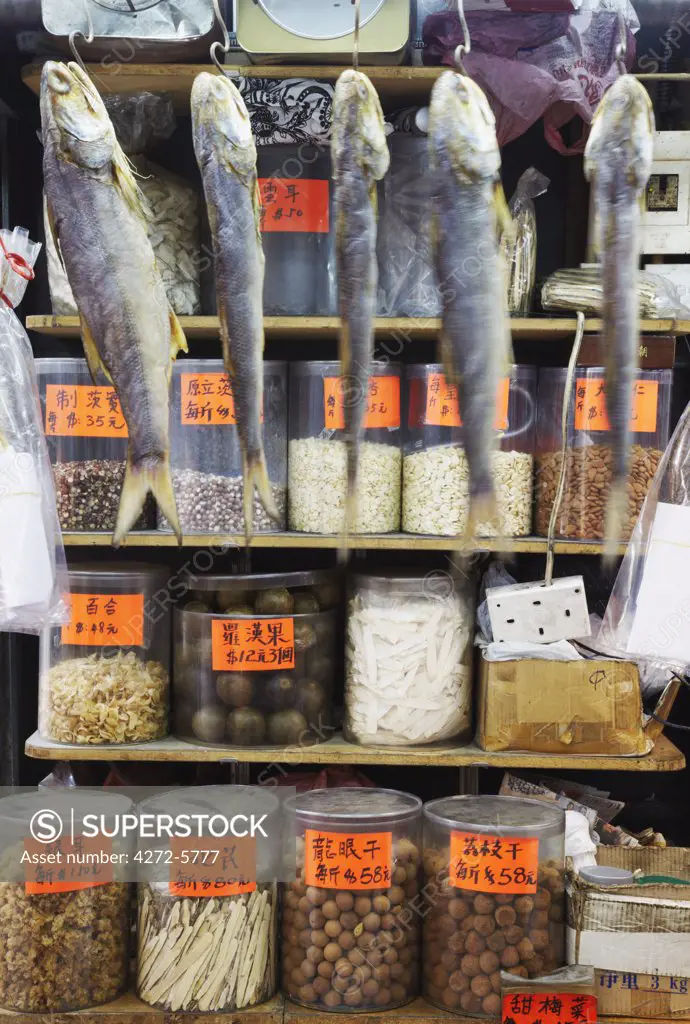 Dried fish hanging up at dried seafood stall, Des Voeux Road West, Sheung Wan, Hong Kong, China