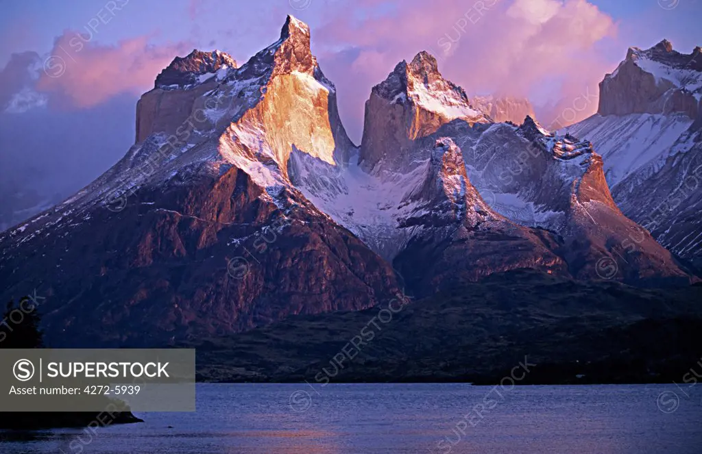 Paine Massif at dawn, seen across Lago Pehoe, Torres del Paine National Park, Chile.