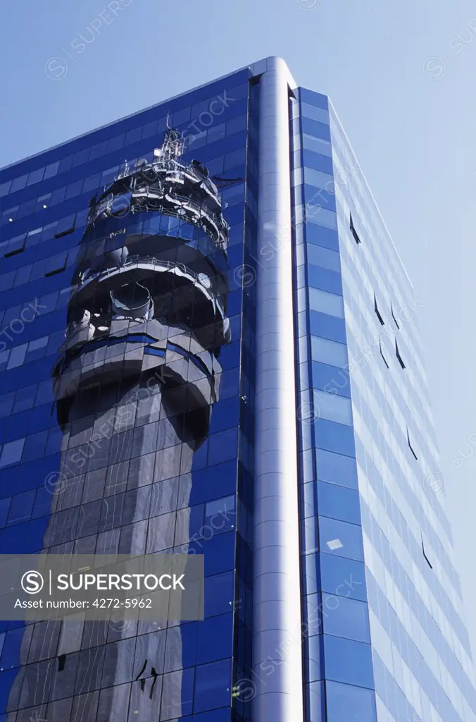 Reflection of the Entel Communications Tower in an office building, La Moneda