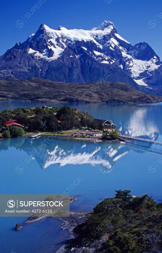 Chile, Torres Del Paine National Park, Lago Pehoe. Hosteria Pehoe with Paine Massif behind.