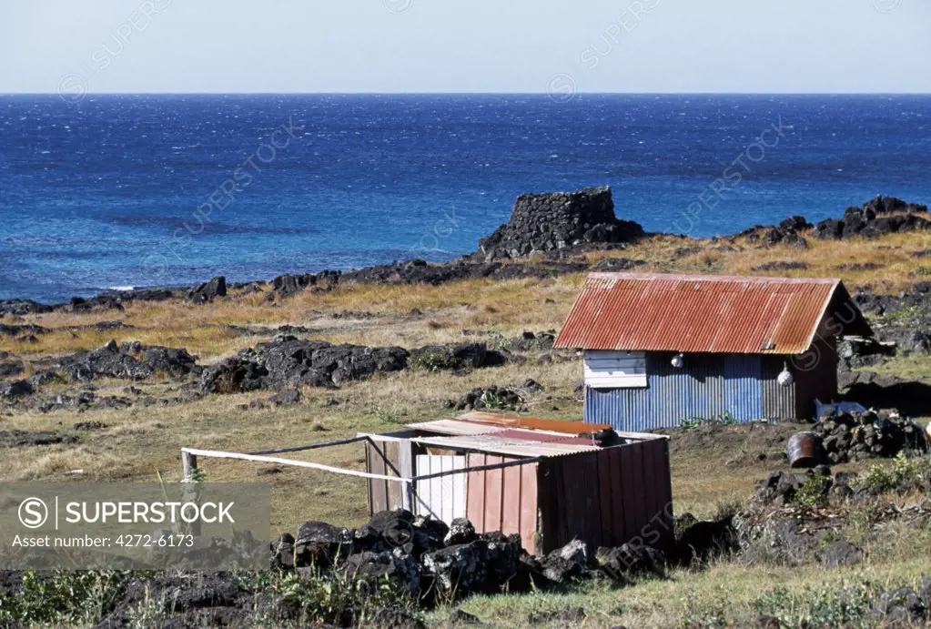 Fishermen's huts look out over La Perouse Bay on the northern coast of the island