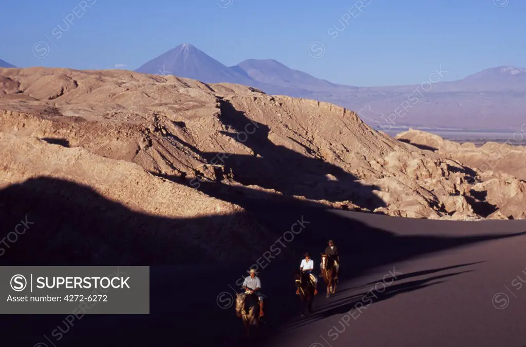 Horse riding amongst the wind-eroded peaks and lunar landscape of  the Salt Mountains