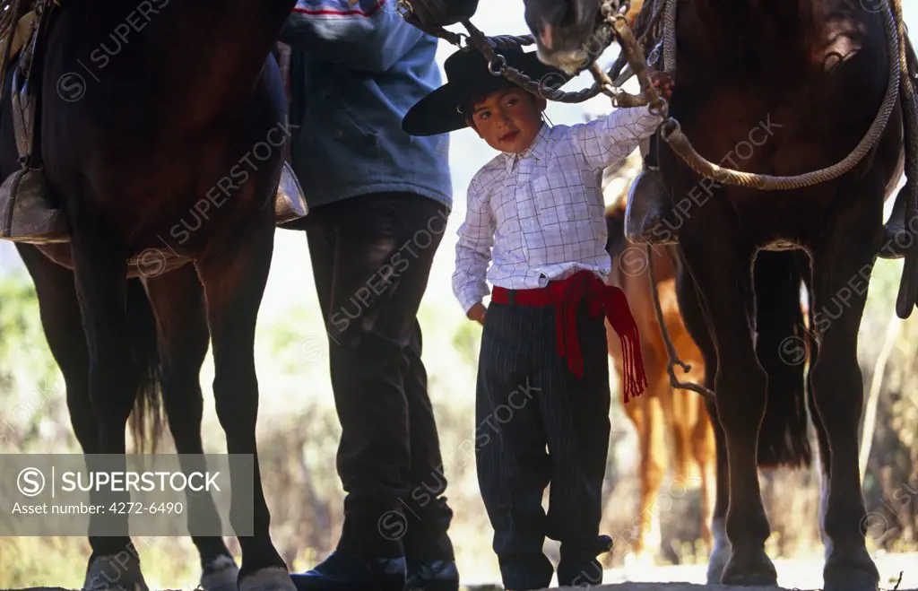 Chile, Cabildo. Huasos taking part in a traditional Rodeo in the village of Cabildo.