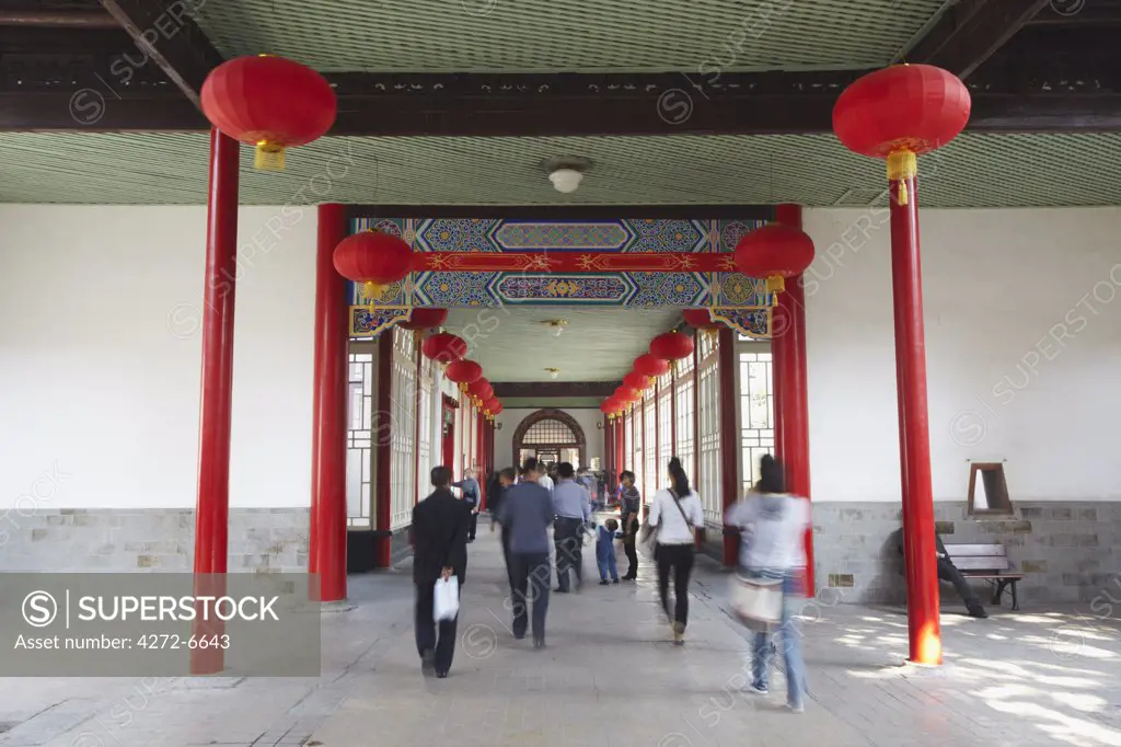 People walking along corridor of Presidential Palace, Nanjing, Jiangsu, China