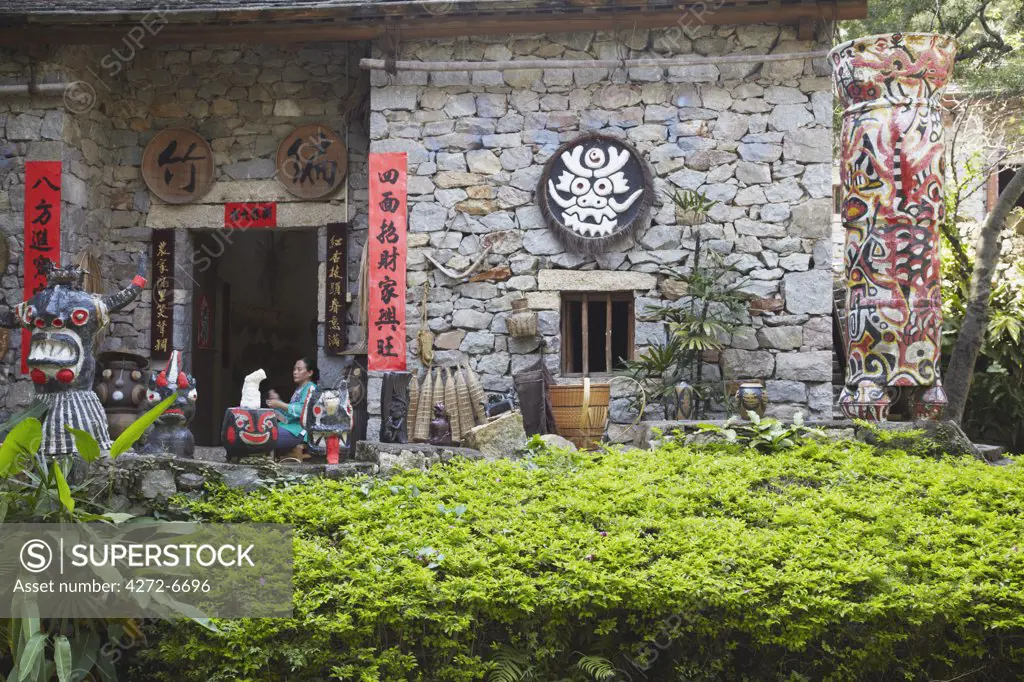 Replica of traditional house of Buyi minority at Folk Culture Village, Shenzhen, Guangdong, China