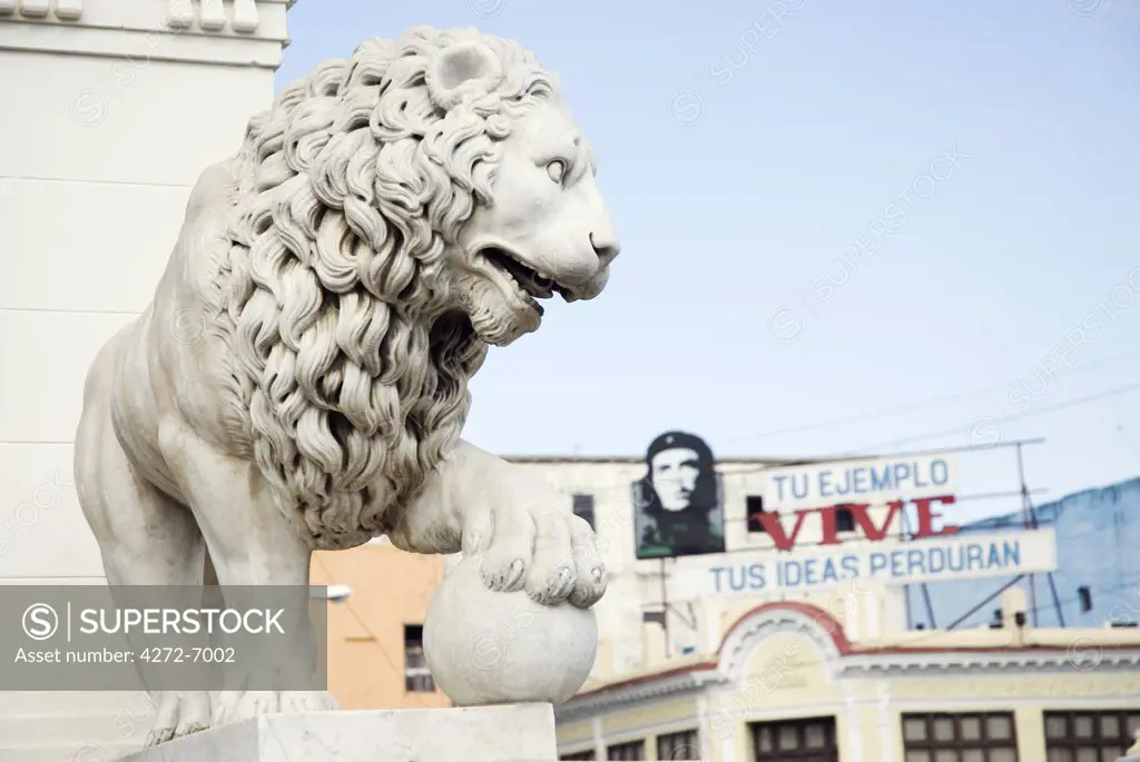 Cuba, Cienfuegos. Staute of a Lion on the edge of Jose Marti Plaza, Cienfuegos