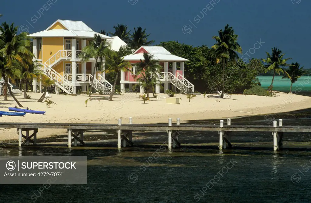 Cayman Islands, Little Cayman. Beach-front condominiums and small hotels line part of the island's southwestern coast near Booby pond.