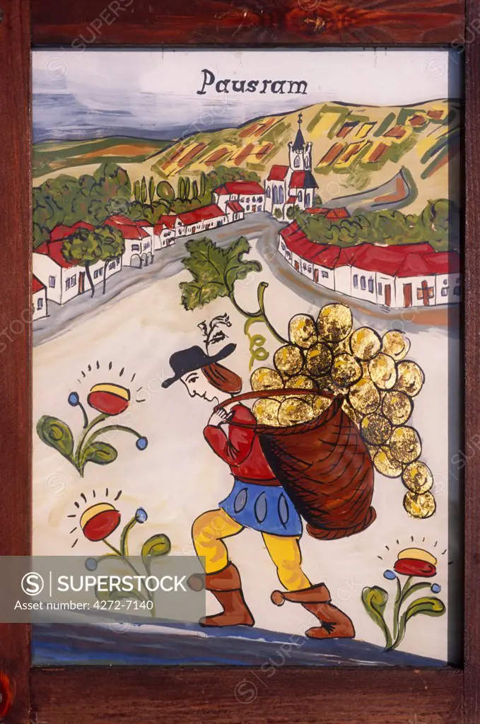 Czech Republic. Painting and applying gold leaf to glass, (folk art) Pouzdrany, Moravia.
