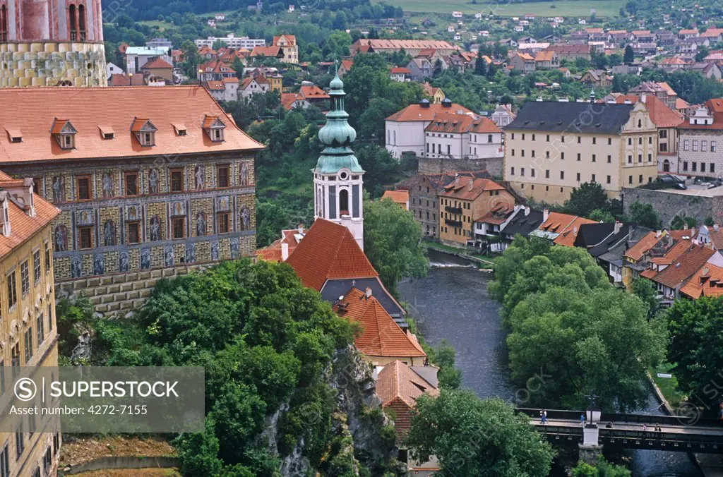 Czech Republic. The town centre of Cesky Krumlov. According to legend, the name Krumlov is derived from the German 'Krumme Aue', which may be translated as 'crooked meadow'. The name comes from the natural topography of the town, specifically from the tightly crooked meander of the Vltava river.