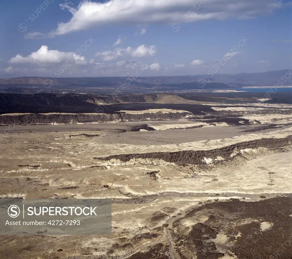 The inhospitable countryside between Garrayto and Lake Assal is strewn with lava and pale, friable material discharged from nearby volcanoes.