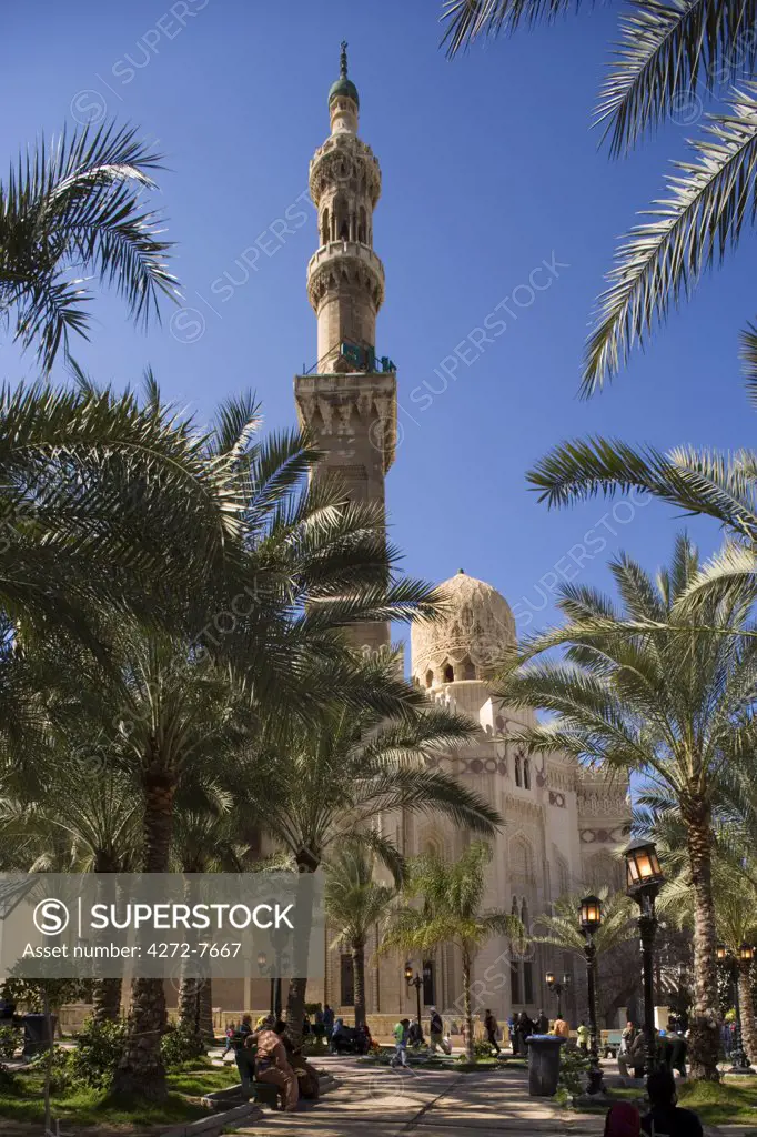 Families relax after Friday prayers in the tree-lined garden of the Abu Al-Abbas Al-Mursi Mosque,  Alexandria, Egypt.