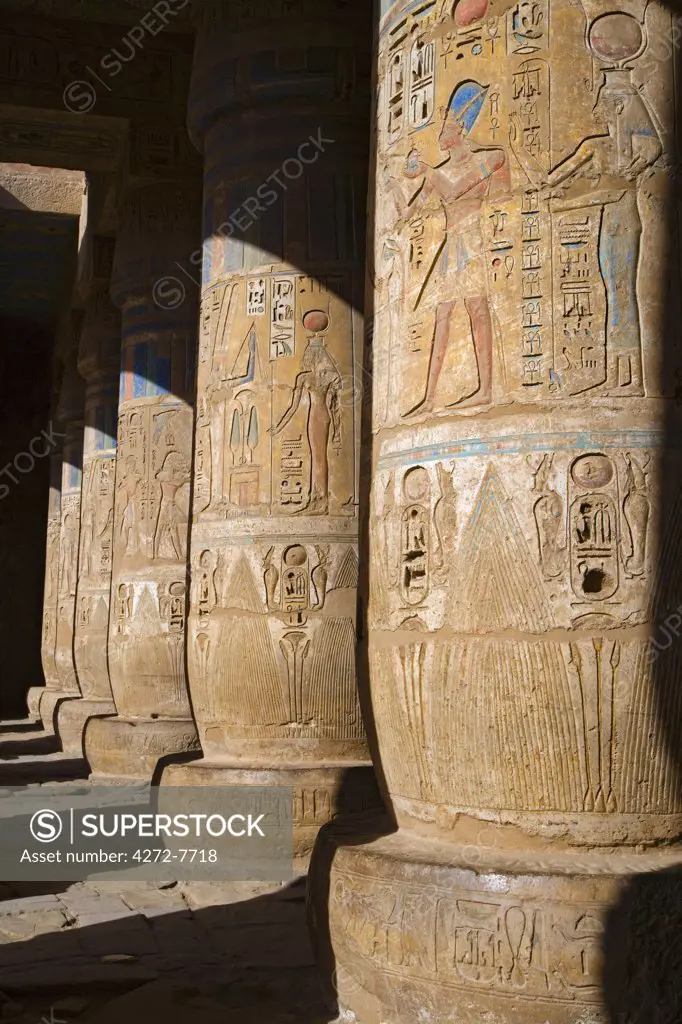 The colours of the original painting dating from the New Kingdom can still be seen on the columns of Ramses III's mortuary temple at Medinet Habu on the West Bank, Luxor, Egypt