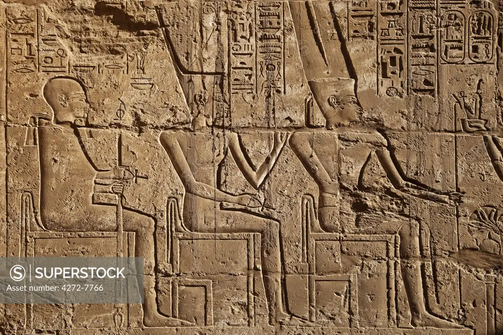Egypt, Qina, Luxor, Al Karnak, Detailed stone carving in the Shrine of Seti II in the Karnak Temple Complex.