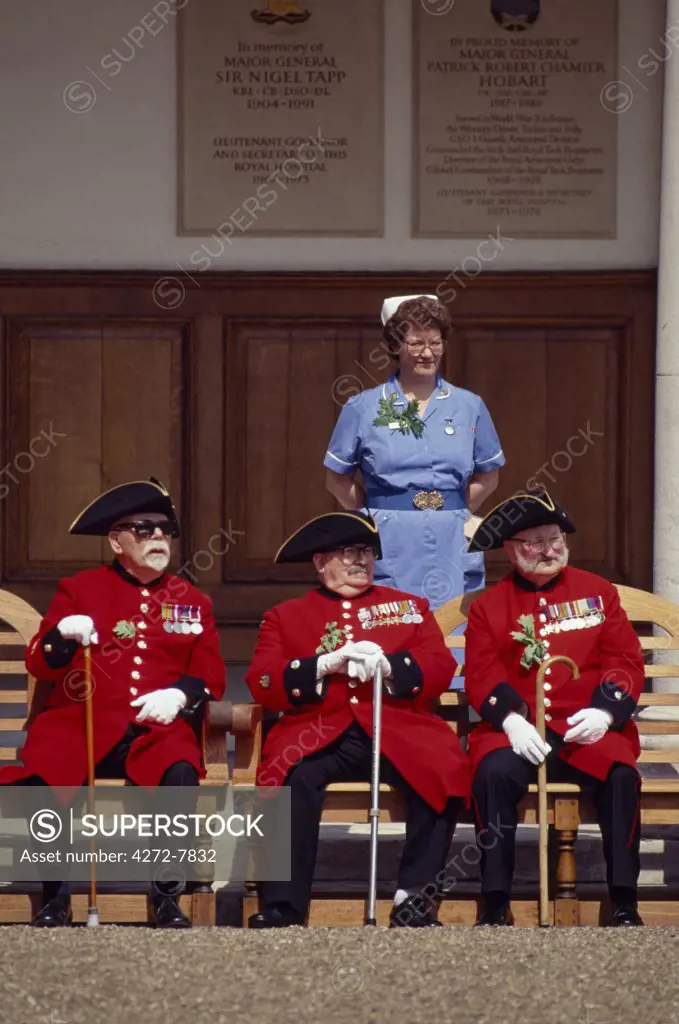 Chelsea Pensioners watch proceedings at Founders Day, Royal Chelsea Hospital, London, England.