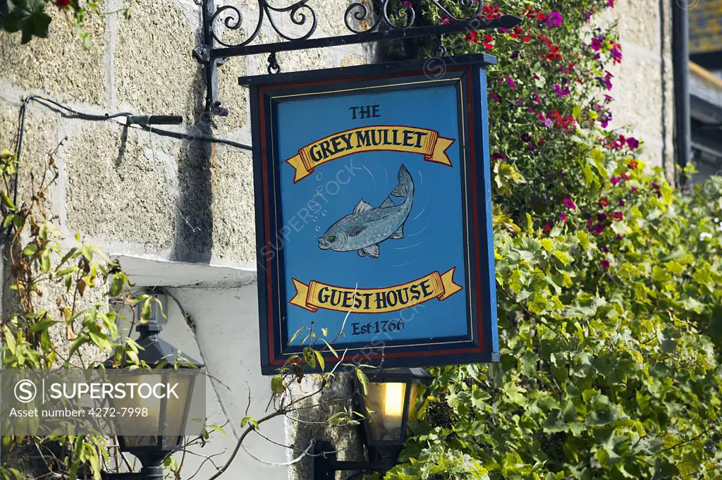 The sign outside the Grey Mullet Guest House in the Fifherman's Quater of St Ives, Cornwall. Once the home of one of the largest fishing fleets in Britain, the industry has since gone into decline. Tourism is now the primary industry of this popular seaside resort town.