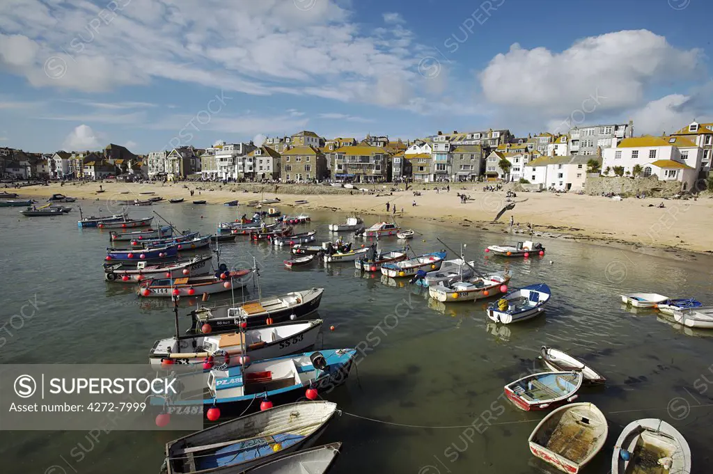 Boats in the harbour of St Ives, Cornwall. Once the home of one of the largest fishing fleets in Britain, the industry has since gone into decline. Tourism is now the primary industry of this popular seaside resort town.
