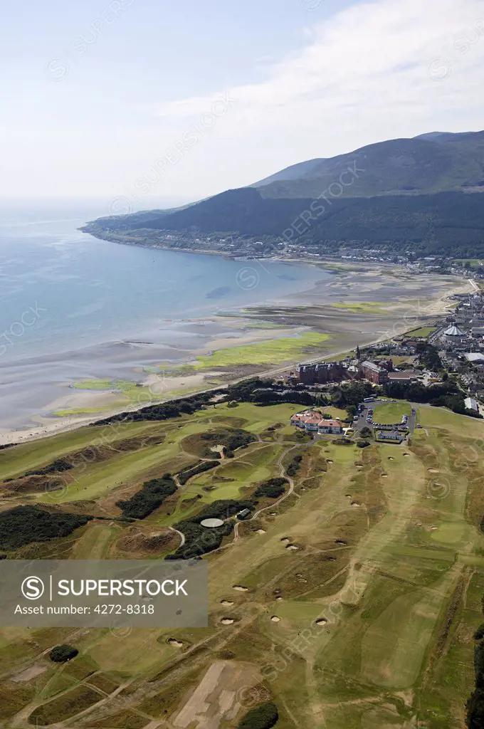 The Royal County Down golf course with the Slieve Donard Hotel, the small coastal town of Newcastle and the Mountains of Mourne behind