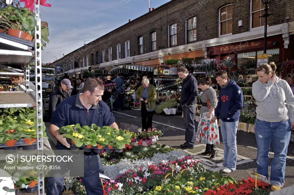 Every Sunday locals flock to the Columbia Road flower market in Hackney, North East London.