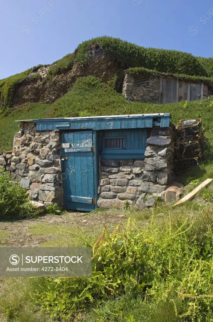 A small fisherman's hut tucked under the lee of the cliff at Cape Cornwall, England