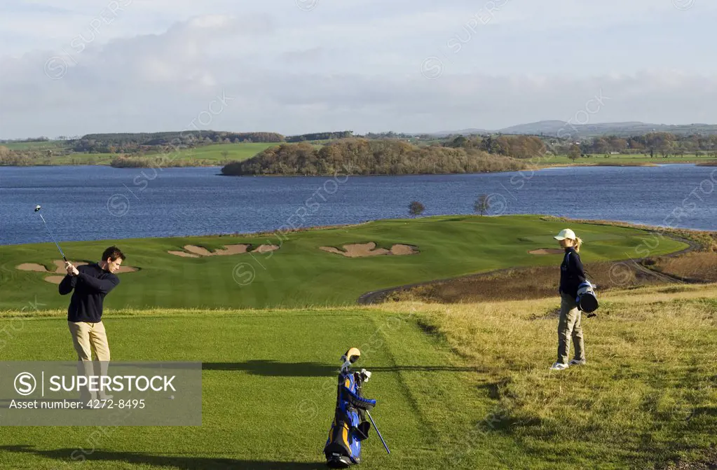 UK, Northern Ireland, Fermanagh. Playing golf on the new course designed by Nick Faldo at Lough Erne Golf Resort (MR).