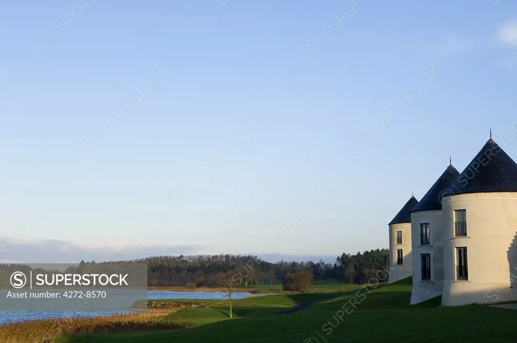 UK, Northern Ireland, Fermanagh, Enniskillen. View of the lake and some of the hotel's 25 lodges at Lough Erne Golf Resort.