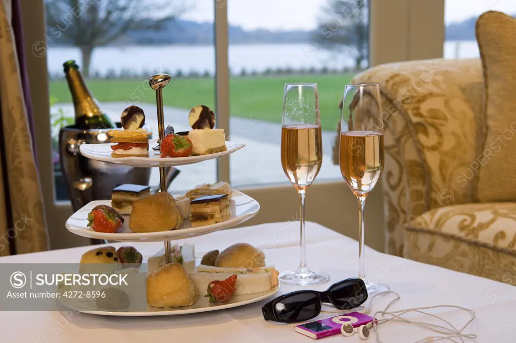 Northern Ireland, Fermanagh, Enniskillen. Tea and pink champagne in the Garden Room at Lough Erne Golf Resort.